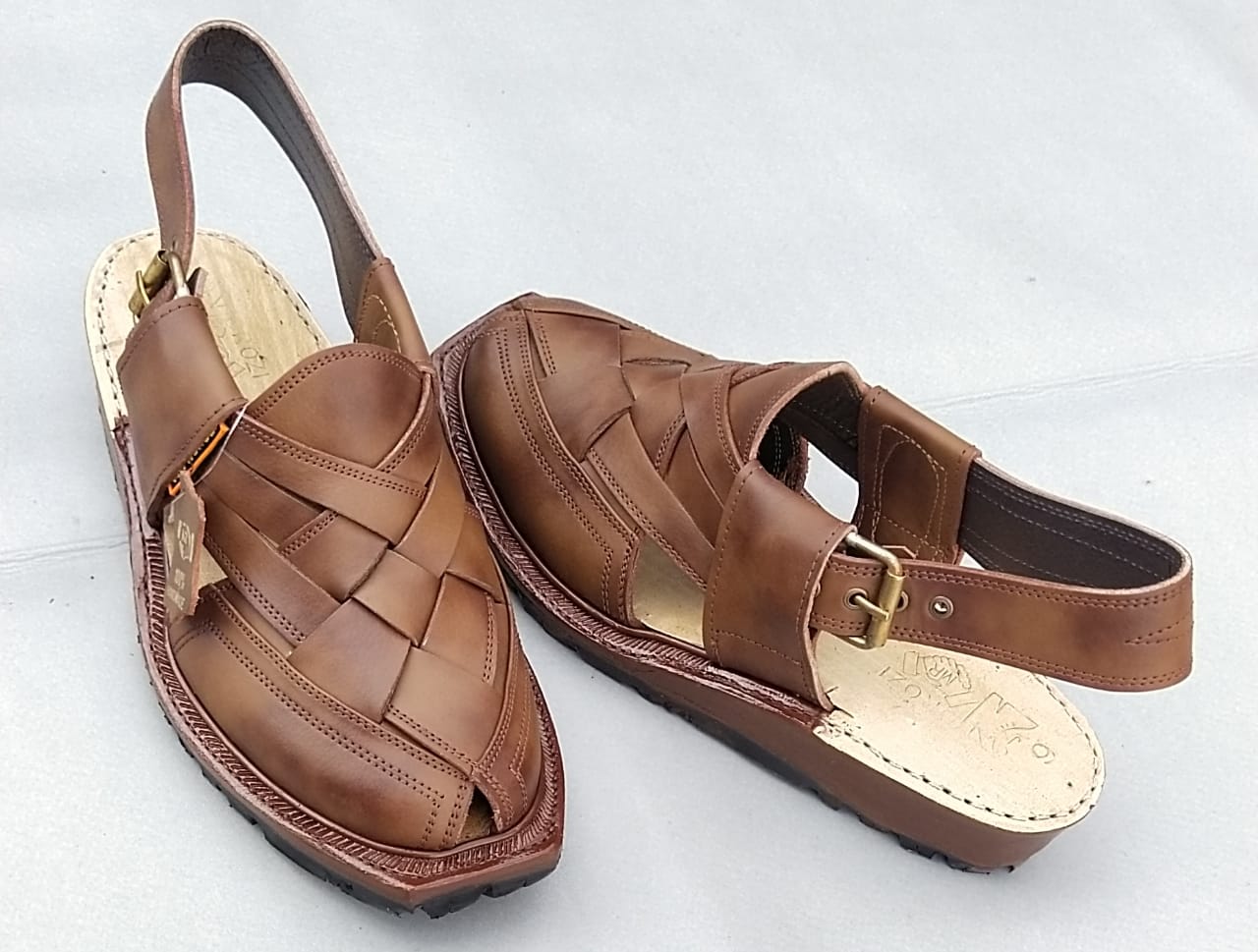 Products Features
The Narozi leather chappal is a stylish and comfortable footwear option 👡crafted from high-quality leather.
These sandals or slippers often featOriginal first class Norozi ChappalSlipperSell MartSell MartOriginal first class
