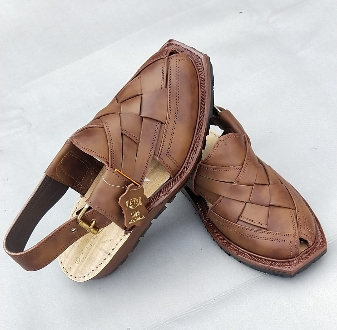 Products Features
The Narozi leather chappal is a stylish and comfortable footwear option 👡crafted from high-quality leather.
These sandals or slippers often featOriginal first class Norozi ChappalSlipperSell MartSell MartOriginal first class